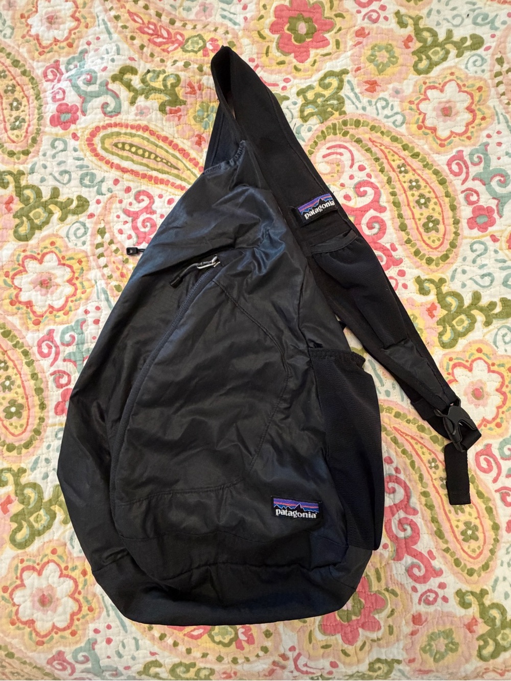 Patagonia Black Sling Pack with Subtle Purple Logo